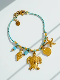 Bransoletka Thalassa Aurea – morska inspiracja z zawieszkami ze złoconego metalu