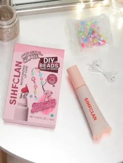 Błyszczyk do ust z bransoletką Gloss & Charm Melon Pop