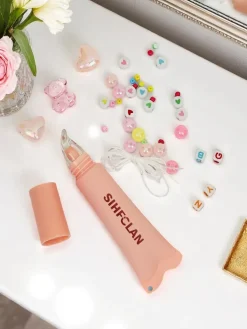 Błyszczyk do ust z bransoletką Gloss & Charm Cocoa Cookie