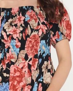 Czarna damska sukienka mini w kwiaty - Odzież