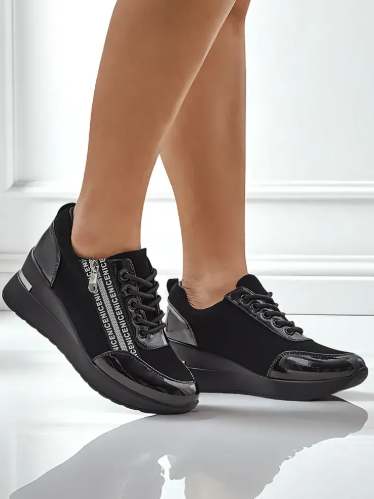 Czarne sneakersy koturny damskie Calista Nero – elegancja i wygoda na co dzień