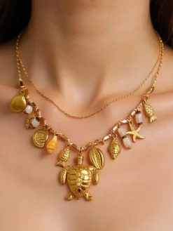 Naszyjnik Atena Charm Sea – złote amulety z motywami morskimi