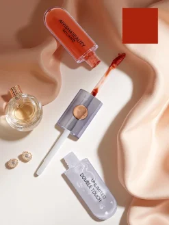 Pomadka do ust i bezbarwny błyszczyk 2w1 Carrot Gold