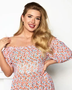 Pomarańczowo- biała sukienka maxi z kwiatowym wzorem- Odzież