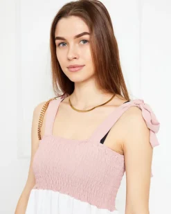 Różowa sukienka damska z wiązanymi ramiączkami - Odzież