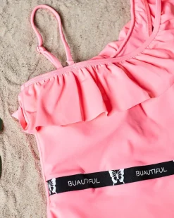 Różowy jednoczęściowy kostium kąpielowy damski z falbanką - Bielizna