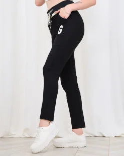 Royalfahion Damskie czarne spodnie w sportowym stylu z naszywką PLUS SIZE
