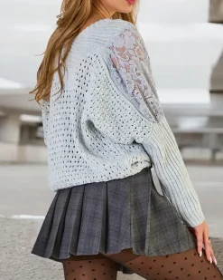 Royalfashion Ażurowy sweter damski z koronką