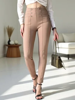 Royalfashion Bawełniane spodnie typu tregginsy damskie z ozdobnymi guzikami