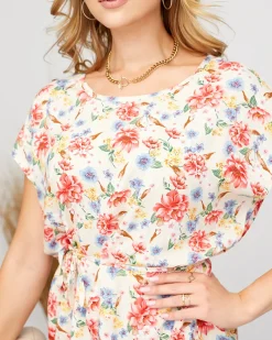 Royalfashion Beżowa damska prosta sukienka z kwiatowym wzorem