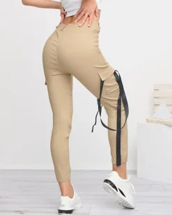 Royalfashion Beżowe damskie spodnie bojówki z paskiem