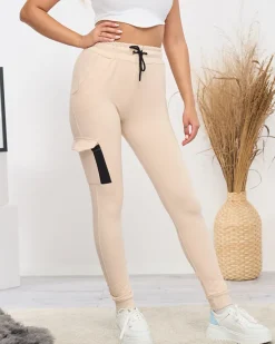 Royalfashion Beżowe damskie bawełniane spodnie dresowe