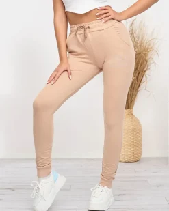 Royalfashion Beżowe damskie spodnie dresowe z cyrkoniami