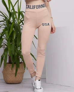 Royalfashion Beżowe damskie prążkowane legginsy z napisami