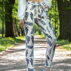 Royalfashion Białe damskie tregginsy w piórka