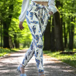 Royalfashion Białe damskie tregginsy w piórka