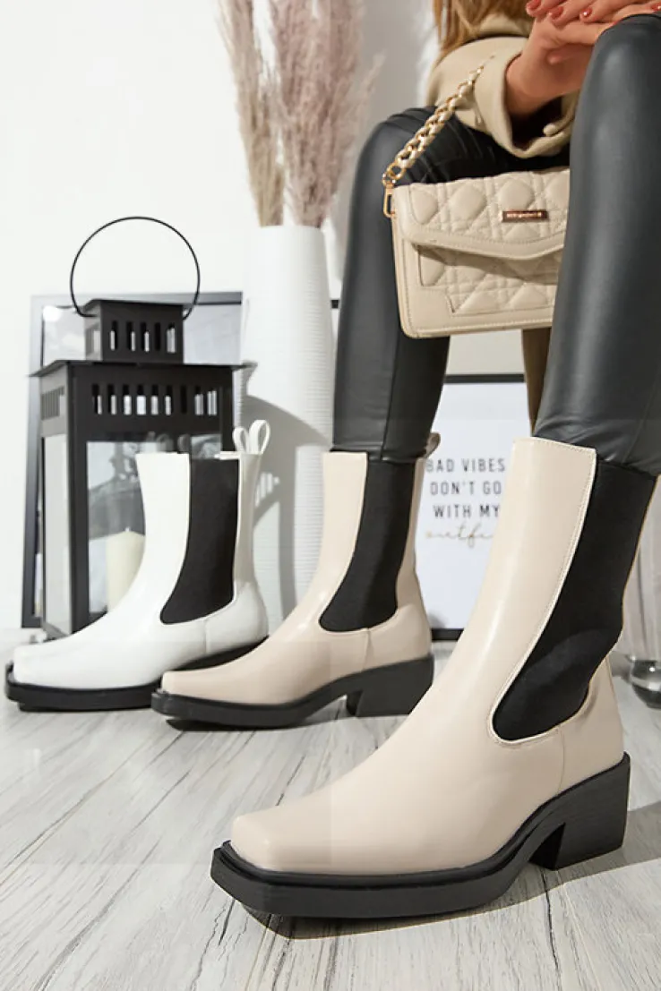 Royalfashion Białe wsuwane damskie wysokie botki Darran