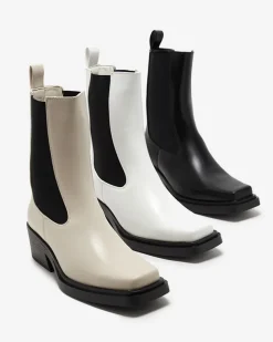 Royalfashion Białe wsuwane damskie wysokie botki Darran