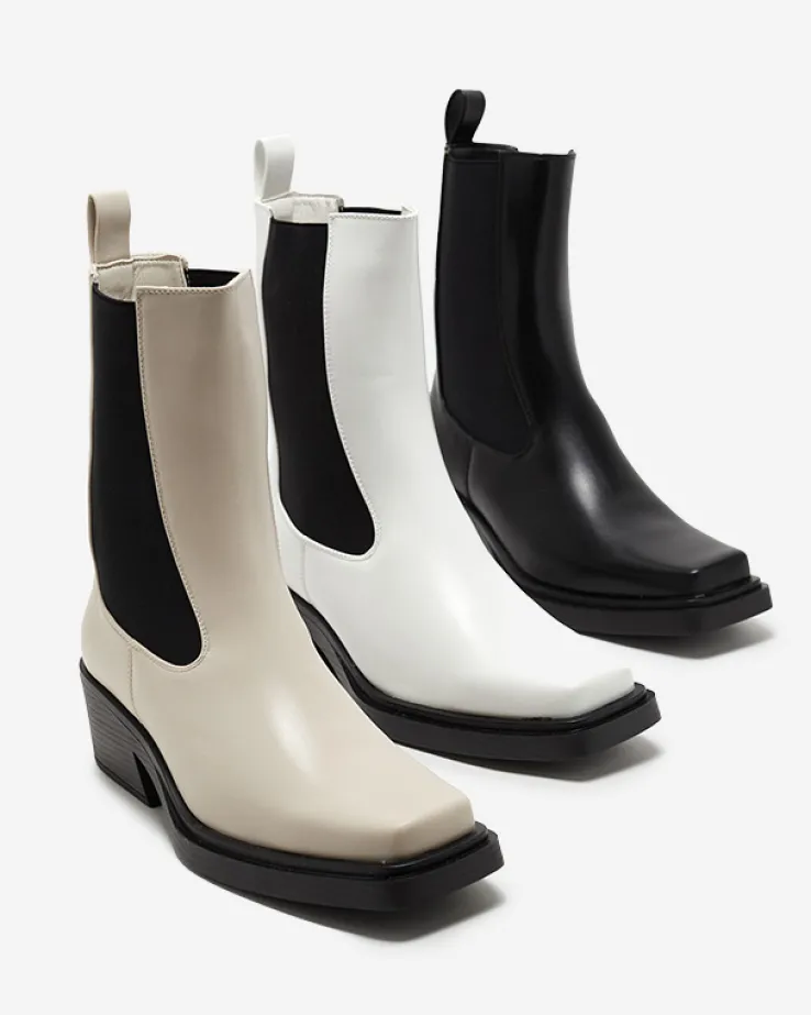 Royalfashion Białe wsuwane damskie wysokie botki Darran