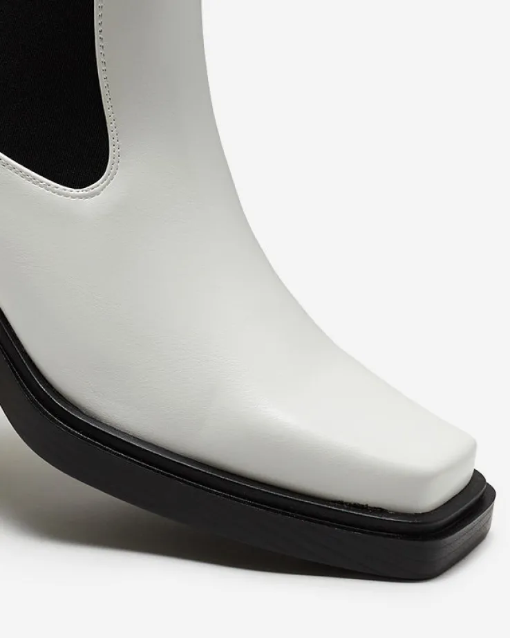 Royalfashion Białe wsuwane damskie wysokie botki Darran