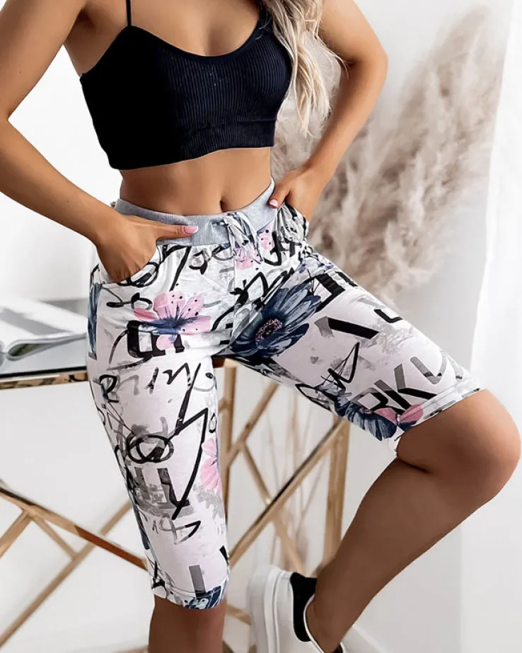 Royalfashion Biało- niebieskie spodenki damskie 3/4 z printem