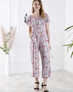 Royalfashion Biało- różowy długi kombinezon damski w kwiaty