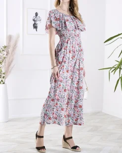 Royalfashion Biało- różowy długi kombinezon damski w kwiaty