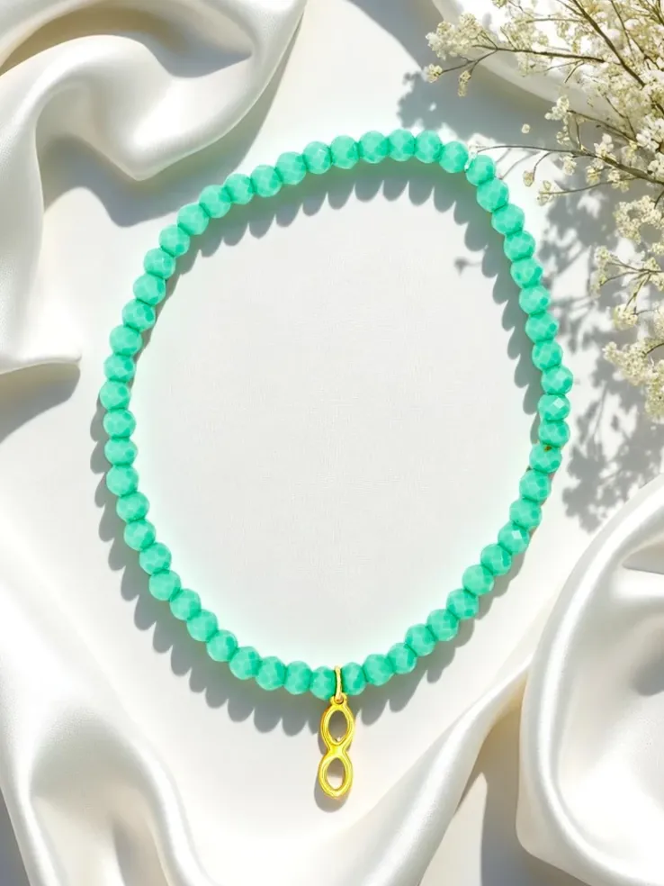 Royalfashion Bransoletka damska z zawieszką nieskończoności