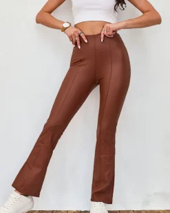 Royalfashion Brązowe damskie eko-skórzane legginsy a'la dzwony