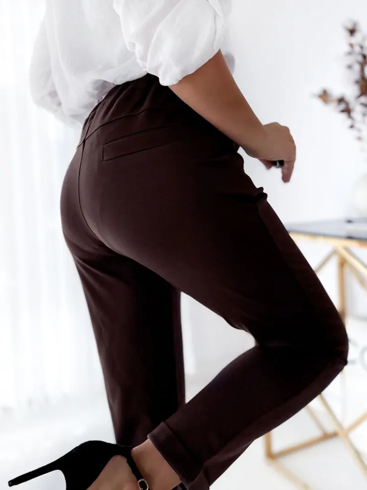 Royalfashion Ciemnobrązowe damskie spodnie typu tregginsy