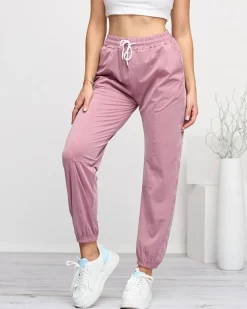 Royalfashion Ciemnoróżowe damskie spodnie dresowe typu joggery