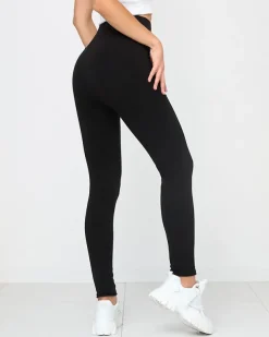 Royalfashion Czarne klasyczne damskie ocieplane legginsy PLUS SIZE
