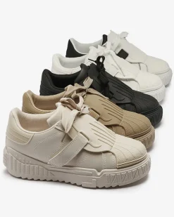 Royalfashion Czarno-białe damskie buty sportowe z gumowymi wstawkami Inika