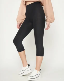 Royalfashion Damskie czarne legginsy o długości 3/4