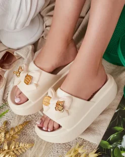 Royalfashion Damskie gumowe klapki z ozdobną kokardką Nilm