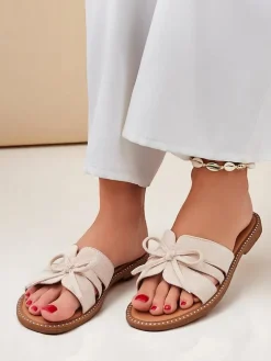 Royalfashion Damskie klapki na płaskiej podeszwie z kokardką Gerber