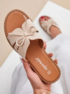 Royalfashion Damskie klapki na płaskiej podeszwie z kokardką Gerber