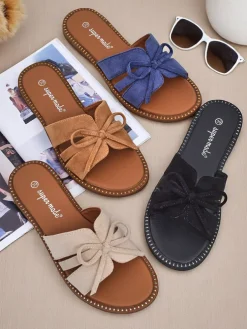 Royalfashion Damskie klapki na płaskiej podeszwie z kokardką Gerber