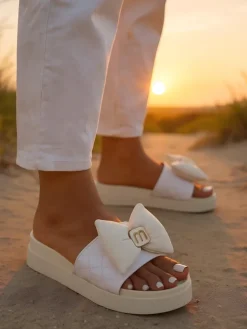 Royalfashion Damskie klapki na platformie z kokardką Mivo Jump