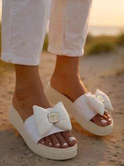 Royalfashion Damskie klapki na platformie z kokardką Mivo Jump