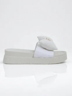 Royalfashion Damskie klapki na platformie z kokardką Mivo Jump