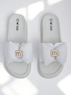 Royalfashion Damskie klapki na platformie z kokardką Mivo Jump