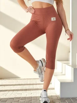 Royalfashion Damskie prążkowane legginsy z bawełny 3/4