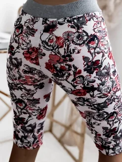 Royalfashion Damskie spodenki 3/4 w białym kolorze i w kwiaty