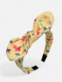 Royalfashion Dziecięca opaska do włosów z kokardką z printem