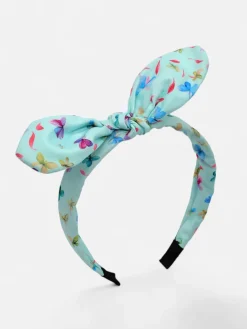 Royalfashion Dziecięca opaska do włosów z kokardką z printem