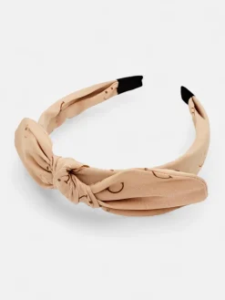 Royalfashion Dziecięca opaska do włosów z kokardką z printem w uśmiechnięte buźki