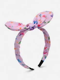 Royalfashion Dziecięca opaska do włosów z kokardką z printem