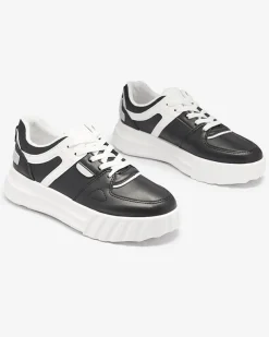 Royalfashion Eko-skórzane damskie czarne casualowe buty sportowe z białymi wstawkami Netiris