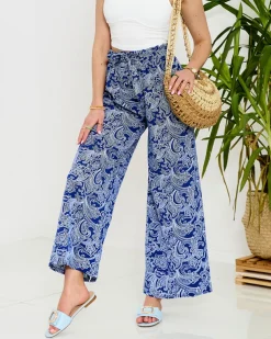 Royalfashion Granatowe damskie spodnie materiałowe z printem